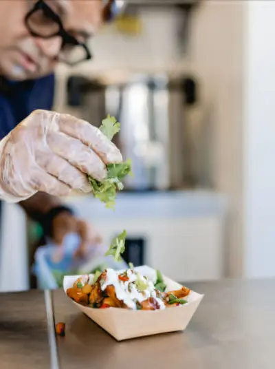 Food truck chef preparing fresh food
