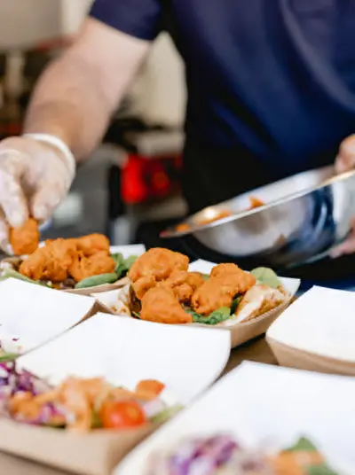 Freshly cooked street food being served
