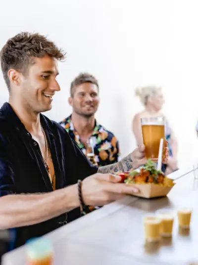 Customers enjoying food at a local event
