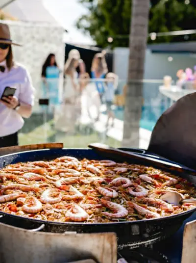 Paella being served at a local food event