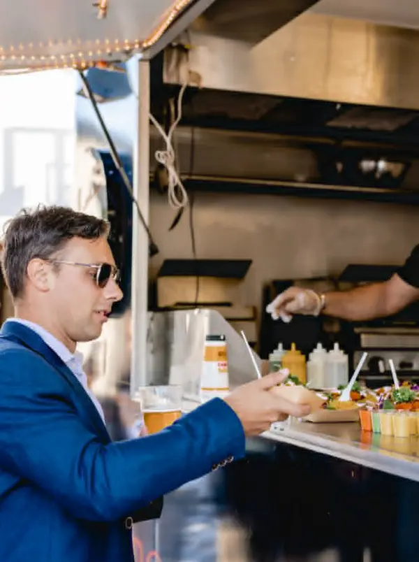 Customer visiting a local food truck